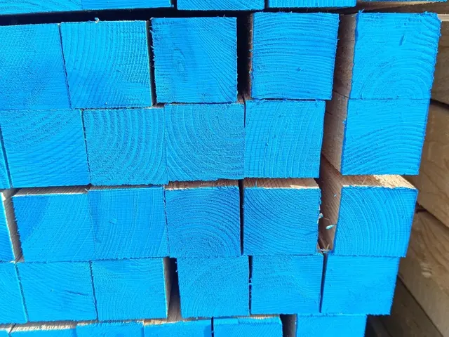 Square white wood sections with blue-painted ends